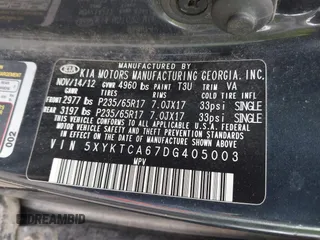 2013 Kia Sorento LX with VIN 5XYKTCA67DG405003, listed as a IAAI auction lot 42253887 with 197,093 mi miles and . Bid and sale history available at DreamBid. Image 9.