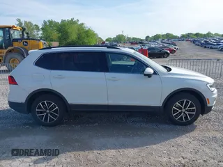 2021 Volkswagen Tiguan SE with VIN 3VV2B7AX6MM139903, listed as a IAAI auction lot 42060657 with 42,747 mi miles and . Bid and sale history available at DreamBid. Image 13.