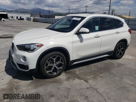 2018 BMW X1 xDrive28i with VIN WBXHT3C35J5L26952, listed as a Copart auction lot 51715035 with 63,306 mi miles and Salvage Title. Bid and sale history available at carsss.com. Image 1.