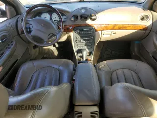 2001 Chrysler LHS z VIN 2C3AC56G31H606648, wystawiony jako Copart lot #77123814 z przebiegiem 83 574 mil mil oraz Tytuł czysty. Historia ofert i sprzedaży dostępna na DreamBid. Obrazek 8.