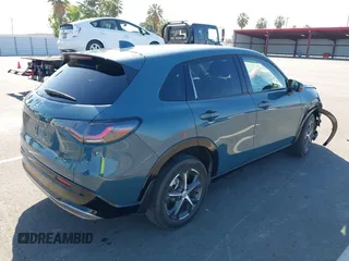 2023 Honda HR-V EX-L with VIN 3CZRZ1H77PM702998, listed as a IAAI auction lot 42267423 with 25,438 mi miles and . Bid and sale history available at DreamBid. Image 4.