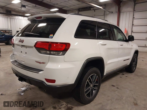 2017 Jeep Grand Cherokee Trailhawk with VIN 1C4RJFLG7HC712208, listed as a IAAI auction lot 42174543 with 158,518 mi miles and . Bid and sale history available at DreamBid. Image 4.