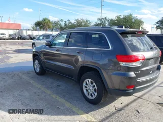 2018 Jeep Grand Cherokee Altitude with VIN 1C4RJFAG9JC459143, listed as a IAAI auction lot 38138630 with 71,150 mi miles and . Bid and sale history available at DreamBid. Image 3.