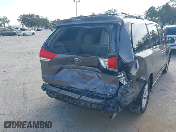 2014 Toyota Sienna LE AAS with VIN 5TDKK3DCXES432611, listed as a IAAI auction lot 40771635 with 214,145 mi miles and . Bid and sale history available at carsss.com. Image 6.