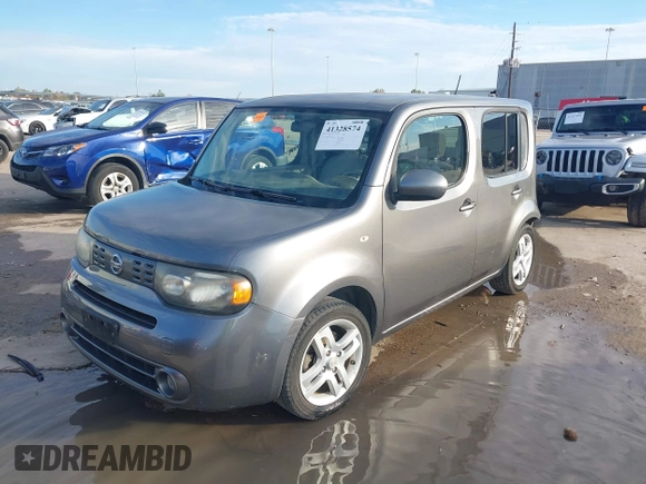 2013 Nissan Cube SL z VIN JN8AZ2KR8DT301092, wystawiony jako IAAI lot #41328574 z przebiegiem Nie podano mil oraz . Historia ofert i sprzedaży dostępna na DreamBid. Obrazek 2.
