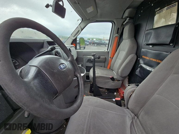 2010 Ford Econoline Cargo Commercial with VIN 1FTNE1EWXADA91296, listed as a IAAI auction lot 42571036 with 154,626 mi miles and . Bid and sale history available at DreamBid. Image 7.