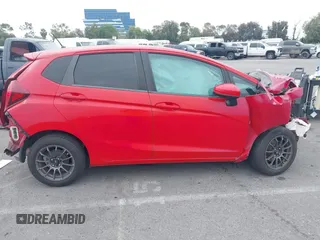 2015 Honda Fit LX with VIN 3HGGK5H5XFM775385, listed as a IAAI auction lot 42555319 with 81,615 mi miles and . Bid and sale history available at DreamBid. Image 14.