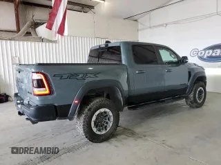 2021 Ram 1500 with VIN 0K1905786880, listed as a Copart auction lot 61756114 with 34,927 mi miles and Clean title. Bid and sale history available at DreamBid. Image 3.