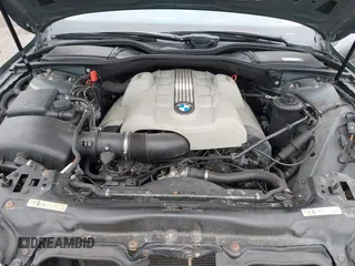 2005 BMW 7 Series 745Li with VIN WBAGN63595DS56807, listed as a IAAI auction lot 42018921 with 128,230 mi miles. Bid and sale history available at carsss.com. Image 10.