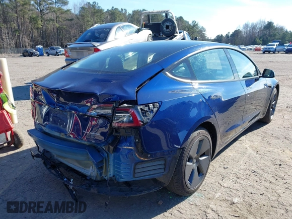 2022 Tesla Model 3 Long Range with VIN 5YJ3E1EB1NF257059, listed as a IAAI auction lot 41329318 with 30,652 mi miles and . Bid and sale history available at DreamBid. Image 4.