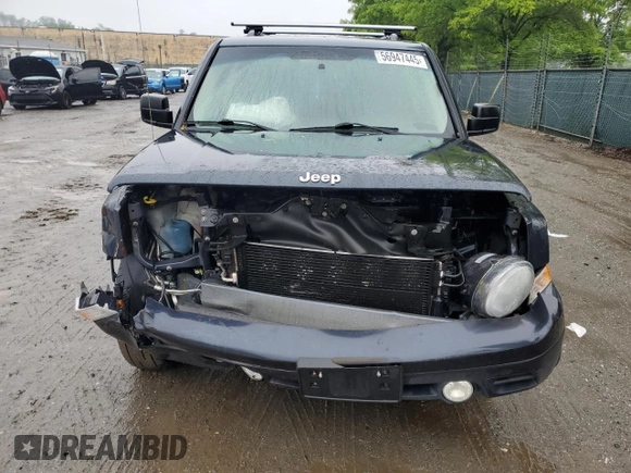 2014 Jeep Patriot Latitude with VIN 1C4NJPFA1ED651021, listed as a Copart auction lot 56947445 with 137,239 mi miles and Salvage title. Bid and sale history available at DreamBid. Image 5.