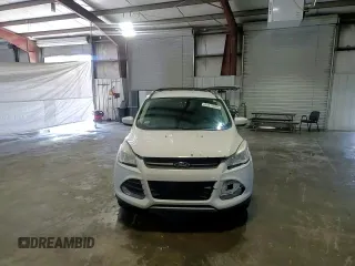 2013 Ford Escape SE z VIN 1FMCU9G93DUA69673, wystawiony jako Copart lot #61017055 z przebiegiem 204 095 mil mil oraz Czysty tytuł • Clean title. Historia ofert i sprzedaży dostępna na DreamBid. Obrazek 14.