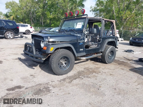 1997 Jeep Wrangler Sport with VIN 1J4FY19S5VP539283, listed as a IAAI auction lot 41996476 with 131,593 mi miles and . Bid and sale history available at DreamBid. Image 2.