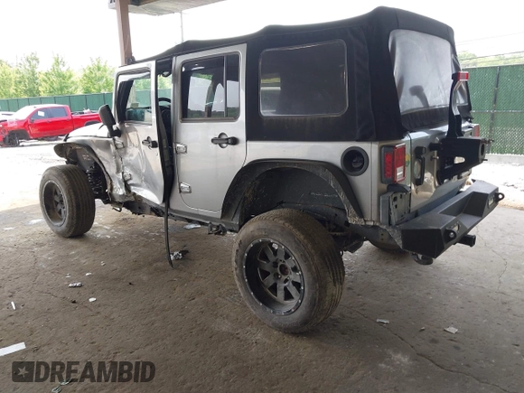 2017 Jeep Wrangler Unlimited Sport with VIN 1C4BJWDG1HL591515, listed as a IAAI auction lot 42426201 with 124,131 mi miles and . Bid and sale history available at DreamBid. Image 3.