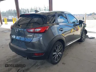 2017 Mazda CX-3 Grand Touring z VIN JM1DKFD70H0150496, wystawiony jako IAAI lot #41746038 z przebiegiem 108 091 mil mil oraz . Historia ofert i sprzedaży dostępna na DreamBid. Obrazek 4.