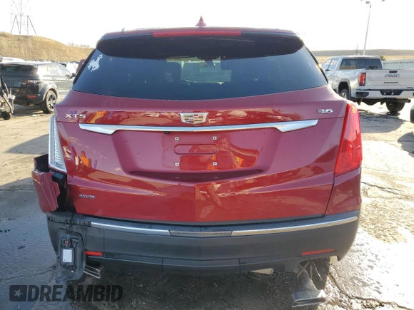 2019 Cadillac XT5 Luxury AWD with VIN 1GYKNDRSXKZ286616, listed as a Copart auction lot 48807865 with 77,074 mi miles and Salvage Title. Bid and sale history available at carsss.com. Image 6.
