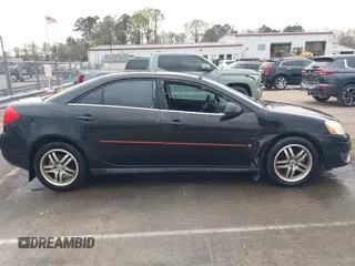2009 Pontiac G6 1SB with VIN 1G2ZJ57B594263412, listed as a IAAI auction lot 41844953 with 234,057 mi miles and . Bid and sale history available at DreamBid. Image 13.