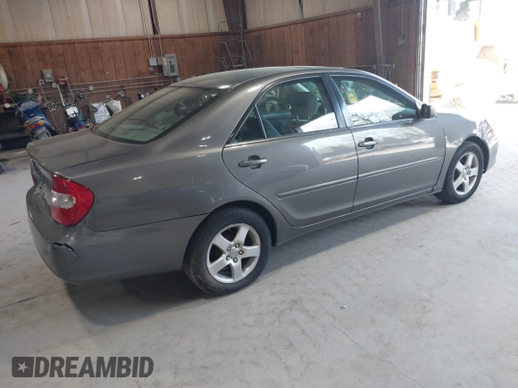 2004 Toyota Camry LE with VIN 4T1BE32K44U854932, listed as a IAAI auction lot 42133289 with 196,613 mi miles. Bid and sale history available at carsss.com. Image 4.