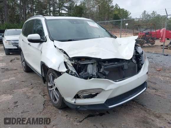 2017 Honda Pilot Elite with VIN 5FNYF6H04HB042192, listed as a IAAI auction lot 41780875 with 158,491 mi miles and . Bid and sale history available at DreamBid. Image 6.