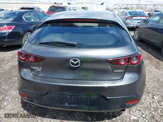 2021 Mazda Mazda3 Hatchback Select with VIN JM1BPBKLXM1337797, listed as a IAAI auction lot 42018058 with 46,763 mi miles. Bid and sale history available at carsss.com. Image 17.