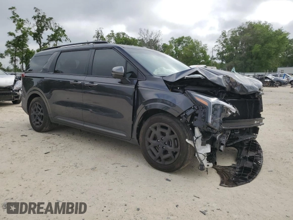2025 Kia Carnival SX with VIN KNDNE5K37S6490478, listed as a Copart auction lot 51389565 with 6,929 mi miles and Salvage Title. Bid and sale history available at DreamBid. Image 4.