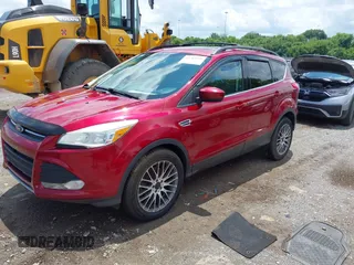 2013 Ford Escape SE with VIN 1FMCU9GX8DUB80346, listed as a IAAI auction lot 42789409 with 157,200 mi miles and . Bid and sale history available at DreamBid. Image 2.