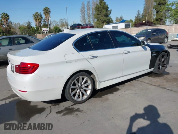 2015 BMW 5 Series 528i with VIN WBA5A5C59FD524043, listed as a IAAI auction lot 42023892 with 94,216 mi miles and . Bid and sale history available at carsss.com. Image 4.