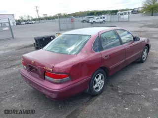 1997 Toyota Avalon XL with VIN 4T1BF12B5VU185685, listed as a IAAI auction lot 42037605 with 150,999 mi miles. Bid and sale history available at carsss.com. Image 4.