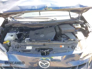 2014 Mazda 5 Sport with VIN JM1CW2BLXE0175975, listed as a IAAI auction lot 40278614 with 102,430 mi miles and . Bid and sale history available at DreamBid. Image 10.