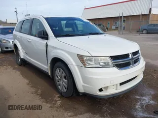 2014 Dodge Journey American Value with VIN 3C4PDCAB1ET209973, listed as a IAAI auction lot 41803864 with 168,774 mi miles and . Bid and sale history available at DreamBid. Image 1.