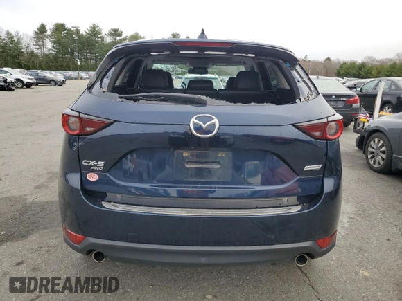 2018 Mazda CX-5 Touring with VIN JM3KFBCM9J0433729, listed as a Copart auction lot 49945515 with 143,064 mi miles and Salvage Title. Bid and sale history available at carsss.com. Image 6.