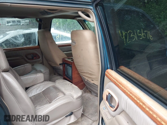 1995 GMC Suburban with VIN 1GDFK16K8SJ741041, listed as a IAAI auction lot 42315676 with 159,312 mi miles and . Bid and sale history available at DreamBid. Image 8.