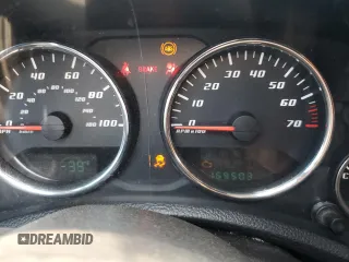 2013 Jeep Wrangler Sport with VIN 1C4AJWAG0DL696928, listed as a Copart auction lot 60822915 with 169,503 mi miles and Salvage title. Bid and sale history available at DreamBid. Image 9.