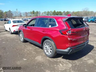 2023 Honda CR-V EX-L with VIN 2HKRS4H75PH406847, listed as a IAAI auction lot 41795117 with 12,879 mi miles. Bid and sale history available at carsss.com. Image 3.