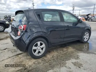 2013 Chevrolet Sonic LS with VIN 1G1JA6SG4D4239041, listed as a Copart auction lot 48250105 with 103,370 mi miles and Salvage title. Bid and sale history available at DreamBid. Image 3.