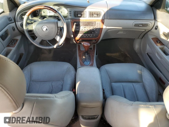 2005 Mercury Sable LS with VIN 1MEFM55S55A626939, listed as a Copart auction lot 83258784 with 94,768 mi miles and Salvage title. Bid and sale history available at DreamBid. Image 8.