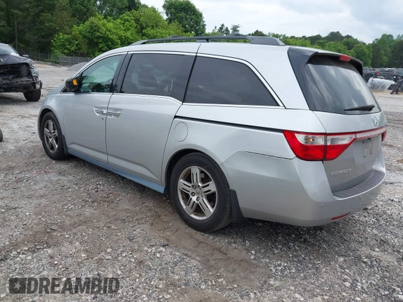2012 Honda Odyssey Touring с VIN 5FNRL5H90CB083157, выставлен на аукционе IAAI как лот 42176609 с пробегом 250 000 миль миль и . История ставок и продаж доступна на DreamBid. Изображение 3.