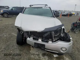 2004 GMC Envoy SLE with VIN 1GKDS13S142358446, listed as a Copart auction lot 43383935 with 154,358 mi miles and Salvage Title. Bid and sale history available at carsss.com. Image 5.