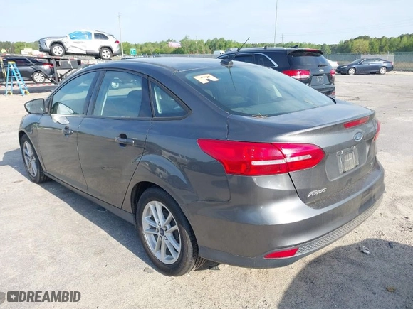 2018 Ford Focus SE with VIN 1FADP3F24JL207231, listed as a IAAI auction lot 42024366 with 134,446 mi miles. Bid and sale history available at carsss.com. Image 3.