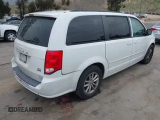 2014 Dodge Grand Caravan SXT with VIN 2C4RDGCG1ER304836, listed as a IAAI auction lot 42049558 with 186,831 mi miles and . Bid and sale history available at DreamBid. Image 4.