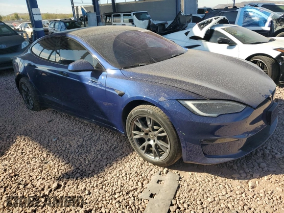 2023 Tesla Model S with VIN 5YJSA1E57PF498760, listed as a Copart auction lot 88494905 with 39,521 mi miles and Salvage title. Bid and sale history available at DreamBid. Image 4.