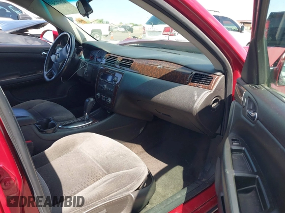 2014 Chevrolet Impala LT with VIN 2G1WB5E38E1132304, listed as a IAAI auction lot 42072869 with 128,579 mi miles and . Bid and sale history available at DreamBid. Image 5.