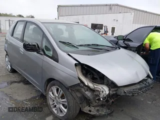 2009 Honda Fit Sport with VIN JHMGE88459C003833, listed as a IAAI auction lot 41927655 with 247,829 mi miles. Bid and sale history available at carsss.com. Image 1.