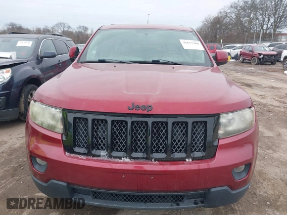 2013 Jeep Grand Cherokee Laredo with VIN 1C4RJEAG4DC573971, listed as a IAAI auction lot 41627288 with 143,256 mi miles. Bid and sale history available at carsss.com. Image 6.