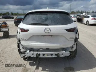 2023 Mazda CX-5 S Premium with VIN JM3KFBDM6P0146078, listed as a Copart auction lot 55654665 with 13,645 mi miles and Salvage Title. Bid and sale history available at DreamBid. Image 6.