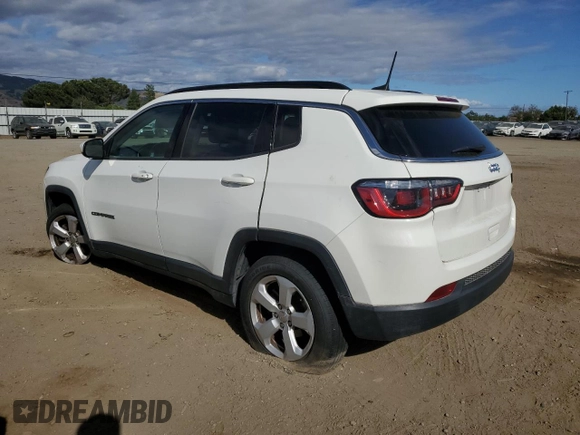 2018 Jeep Compass Latitude with VIN 3C4NJCBB7JT233848, listed as a Copart auction lot 56502715 with 94,665 mi miles and Salvage title. Bid and sale history available at DreamBid. Image 2.
