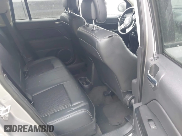 2017 Jeep Compass Sport with VIN 1C4NJCBA5HD166884, listed as a IAAI auction lot 36977902 with 64,921 mi miles and . Bid and sale history available at DreamBid. Image 8.