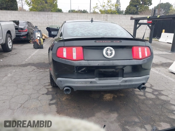 2012 Ford Mustang Premium with VIN 1ZVBP8AM3C5234884, listed as a IAAI auction lot 41880779 with 149,758 mi miles and . Bid and sale history available at DreamBid. Image 16.