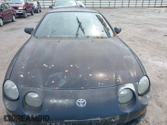 1995 Toyota Celica ST with VIN JT2AT00F7S0040443, listed as a IAAI auction lot 42125327 with 286,767 mi miles. Bid and sale history available at carsss.com. Image 6.