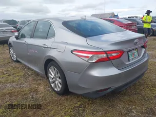 2020 Toyota Camry LE with VIN 4T1C11AK8LU939793, listed as a IAAI auction lot 40523304 with Not Provided miles and . Bid and sale history available at DreamBid. Image 3.